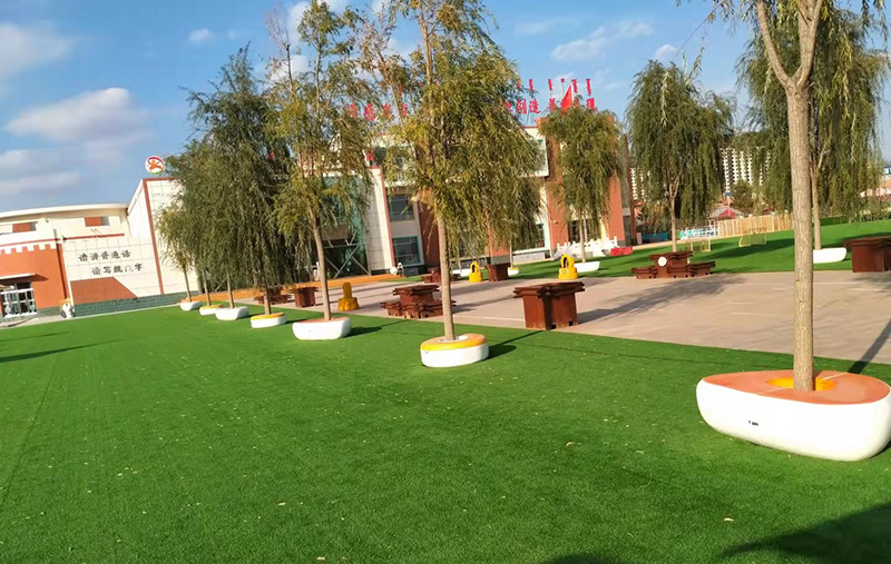 內蒙古鄂爾多斯幼兒園定制一批玻璃鋼樹池坐凳